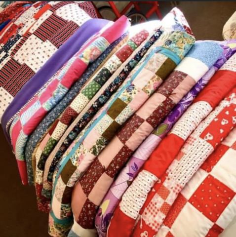 Quilts made by the ladies of the Quilting and Sewing Circle